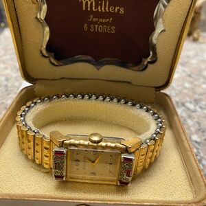 VINTAGE Bulova ladies 10K gold watch ruby and diamonds